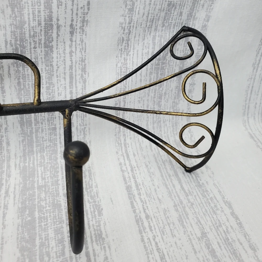 DecorativeIron Trumpet Shape Wall Hook Black w/hints of gold. 21